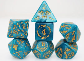 Colorful set of polyhedral RPG dice in cobalt blue with intricate gold designs. The set includes a D20, D12, D10, D8, D6, and D4, perfect for tabletop gaming.