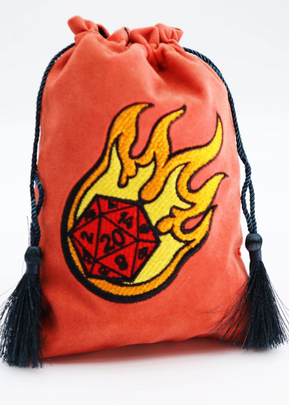 A vibrant orange dice bag featuring a fiery design with a twenty-sided die (D20) partially covered by flames, complete with black tassels for closure. Ideal for tabletop gaming enthusiasts and collectors.