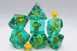 A vibrant Yellow Mushroom RPG Dice Set from Foam Brain Games features a collection of six polyhedral dice in shades of translucent yellow and green, each displaying numbers in shiny gold. Accompanying the dice is a small, cute yellow mushroom figure, adding a whimsical touch to this RPG accessory, ideal for gamers looking to enhance their tabletop experience.