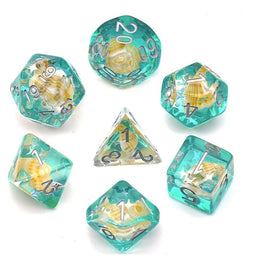 A vibrant Green Conch RPG Dice Set made by Foam Brain Games. This seven-piece dice set features stunning turquoise resin with embedded seashell designs, perfect for tabletop role-playing games. Each die is intricately detailed with silver numbers, showcasing a mix of traditional polyhedral shapes, including a d20, d12, d10, d8, d6, and d4. Ideal for enhancing your gaming experience.