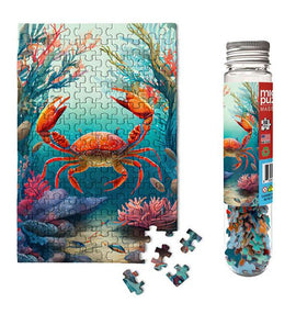 Marine Life Micro Puzzle featuring a vibrant crab design in an underwater scene with colorful corals and sea plants. Includes scattered puzzle pieces and a bottle for storage.