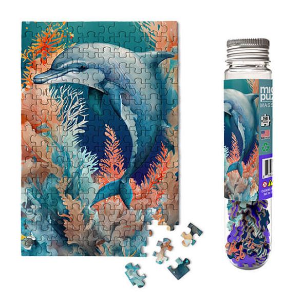 A colorful 100-piece jigsaw puzzle featuring a dolphin swimming amidst vibrant coral reefs. The puzzle is displayed next to its packaging, a glass tube containing puzzle pieces. Ideal for marine life enthusiasts and puzzle lovers.