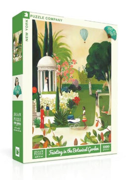 A 1000-piece jigsaw puzzle titled 'Fainting in the Botanical Garden' by New York Puzzle Company. The puzzle box features a colorful illustration of a lush botanical garden, complete with a gazebo, blooming flowers, trees, and people enjoying the scenery. A whimsical hot air balloon can be seen in the sky, adding charm to the serene outdoor scene.