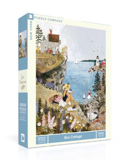 Sea Cottage jigsaw puzzle from New York Puzzle Company featuring a colorful coastal scene with a girl by the shore, boats on the water, and a lighthouse in the background. The box contains 1000 pieces, ideal for puzzle enthusiasts looking for a scenic and artistic challenge.