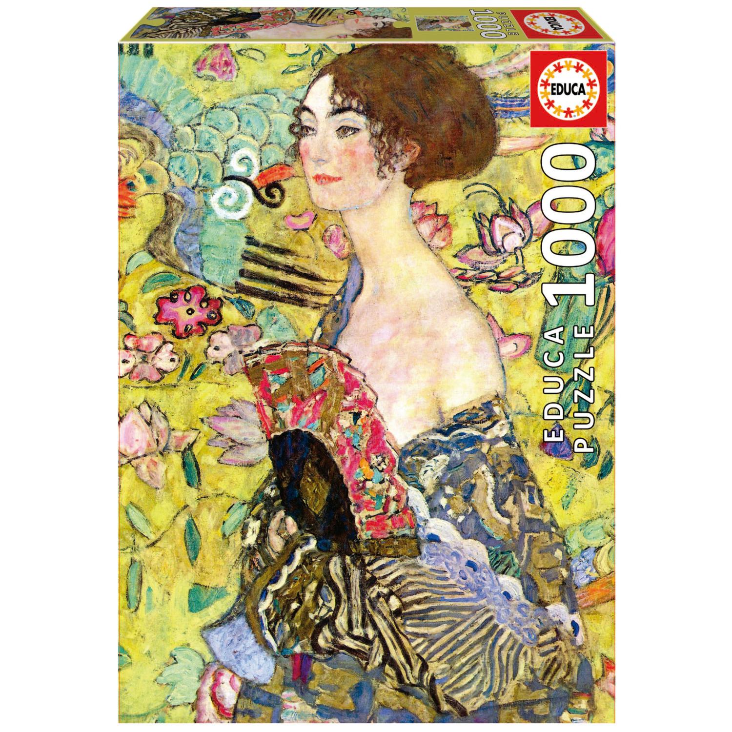 Educa jigsaw puzzle featuring Klimt's 'Lady with a Fan'. The box showcases a vibrant artwork of a woman elegantly holding a beautifully decorated fan amidst colorful floral patterns.