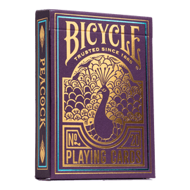 Bicycle Purple Peacock playing cards package showcasing a vibrant purple design with gold accents. The front features an elegant peacock illustration and the brand name 'Bicycle' prominently displayed, symbolizing quality and fun for card games.