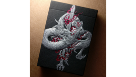 A beautifully illustrated box for Sumi Original Craft Playing Cards, featuring a striking dragon design intertwined with flames and a sword, set against a solid black background. The artwork is detailed and vibrant, showcasing the artistry that defines Card Experiment's unique playing cards.