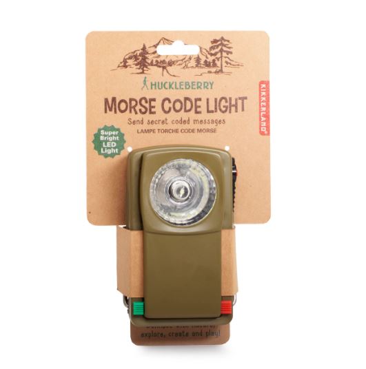 Huckleberry Morse Code Light by Kikkerland, featuring a super bright LED light and an olive green design. The light is compact, making it ideal for sending secret coded messages. Packaging includes instructions for use and promotes exploration and creativity.