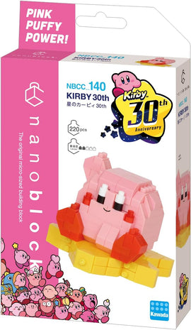 Nanoblock Kirby DIY kit featuring a cute, pink Kirby character celebrating its 30th anniversary. The design includes vibrant colors, detailed features, and a playful pose, all packaged attractively with Kirby-themed graphics.