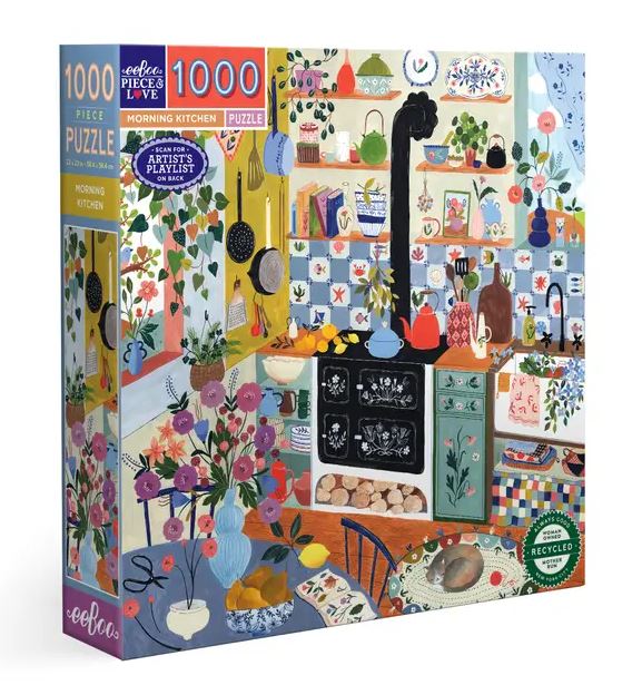 Eeboo Morning Kitchen jigsaw puzzle box featuring a colorful and detailed illustration of a charming kitchen scene. The design includes various kitchenware like pots, pans, and vibrant flowers, perfect for puzzle enthusiasts. The box states that it contains 1000 pieces and showcases an inviting and artistic kitchen atmosphere, ideal for hours of creative enjoyment.