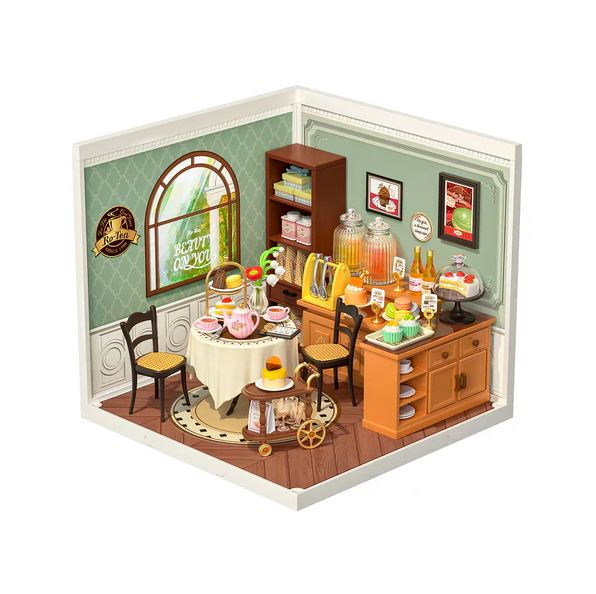 The Sweet Sips Tea DIY kit by Robotime displays a beautifully arranged tea room scene. The setup includes a round table with tea sets, colorful desserts, a shelf filled with jars, and a cart containing various treats, all within a charming corner space. The walls are decorated in pastel colors and feature a large window with a scenic view.