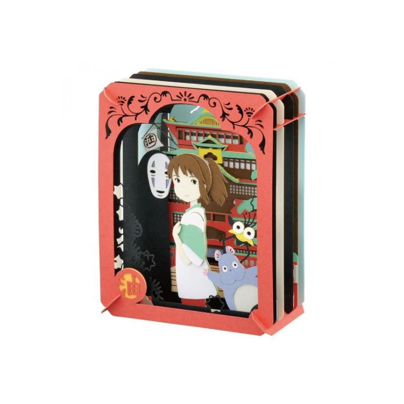 A DIY kit titled 'Paper Theater Chihiro in a Mysterious Town' by Ensky. The kit features intricate paper cutouts showcasing the character Chihiro with iconic figures in a whimsical, colorful setting, perfect for crafting enthusiasts.