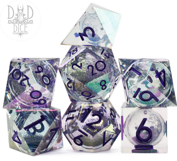 A set of six glittering polyhedral RPG dice from DND Dice, featuring a liquid core with vibrant colors and numbers in a deep purple hue. The arrangement shows a mix of standard RPG dice shapes, including a d20, d12, d10, and d8, all showcasing shimmering glitter and clear resin finishes that reflect light beautifully.