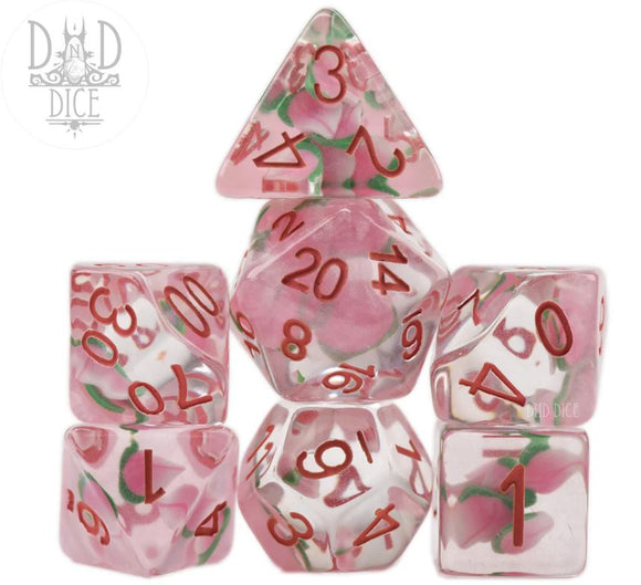 A vibrant set of seven polyhedral RPG dice featuring a peach theme. The dice are translucent with peach illustrations and red numbering, resembling a farmer's market aesthetic, perfect for tabletop gaming enthusiasts.