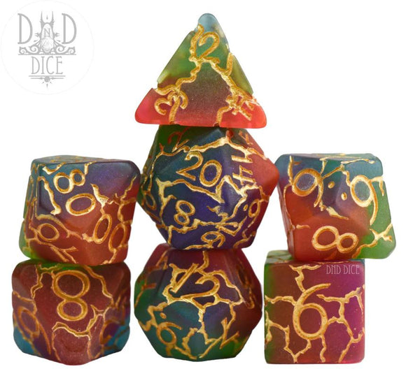 Crackin' Up RPG Dice Set featuring vibrant, multi-colored polyhedral dice with gold numbering. The set includes various shaped dice stacked creatively, showcasing unique design and craftsmanship by DND Dice, ideal for tabletop gaming enthusiasts.