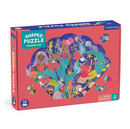 Mermaid Cove Shaped Puzzle by Mudpuppy featuring colorful illustrations of mermaids, sea creatures, and underwater plants. The puzzle is shaped like a heart and contains 75 pieces, making it a fun and engaging activity for children and families.