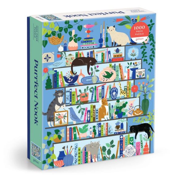 The Purrfect Nook jigsaw puzzle features a colorful illustration of a bookshelf adorned with various plants, books, and playful cats. This 1000-piece puzzle invites cozy moments of assembly, bringing joy to puzzle enthusiasts and cat lovers alike.
