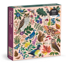 The 'Nature in Autumn' jigsaw puzzle by Galison features a vibrant collection of autumn flora and fauna, including colorful birds, an owl, a squirrel, butterflies, and various leaves and flowers. Packaged in a beautifully illustrated box showcasing the intricate design of the 500 puzzle pieces.
