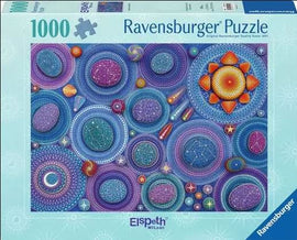 Ravensburger jigsaw puzzle titled 'Celestial Constellations' featuring an intricate design of colorful celestial bodies such as planets, stars, and patterns in a cosmic theme. The puzzle consists of 1000 pieces and showcases vibrant blues, purples, and oranges, creating a mesmerizing astronomical scene.