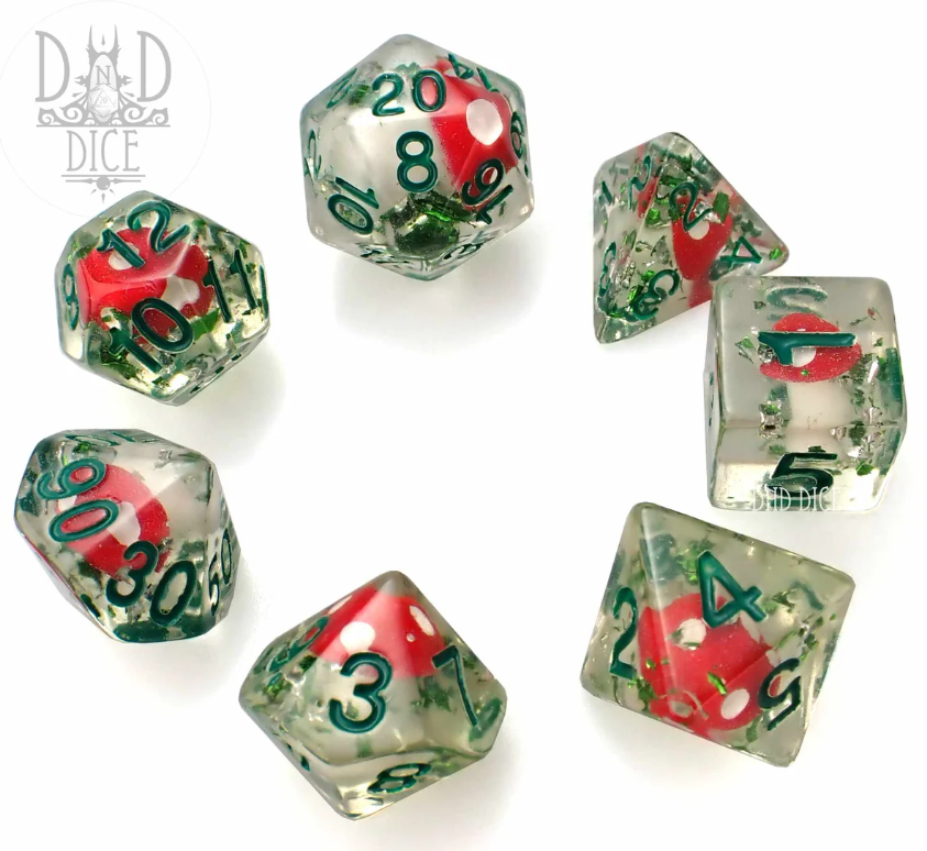 A beautifully crafted 7-piece RPG dice set from DND Dice, featuring transparent polyhedral dice with vibrant green and red speckles. Each die showcases clearly printed numbers in a bold green color, making them easy to read during gameplay. Perfect for tabletop role-playing games.