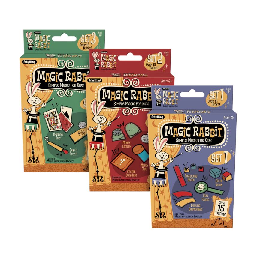 Three colorful packaging sets of MAGIC TRICKS by Schylling, titled 'Simple Magic for Kids'. Each set features vibrant illustrations and includes various magic tricks with a magic instruction booklet. Set 1 in blue includes items like a color vision puzzle, Set 2 in red showcases a money factory, and Set 3 in green features a changing card. Ages 6+.