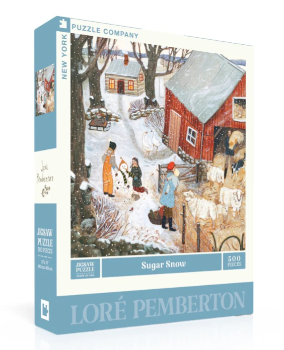 Sugar Snow jigsaw puzzle by New York Puzzle Company featuring a scenic winter landscape. The artwork, created by Loré Pemberton, depicts a charming snowy village with children building a snowman, surrounded by animals and a red barn. The puzzle includes 500 pieces and invites cozy winter fun.