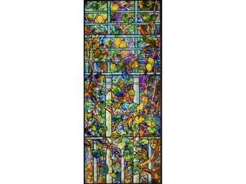 Beautiful jigsaw puzzle featuring a vivid design of lemon trees and grapevines, showcasing colorful leaves and detailing reminiscent of stained glass art by Liberty Puzzles.