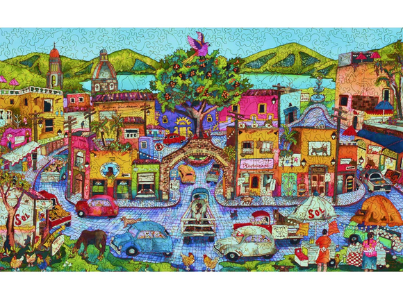 Colorful jigsaw puzzle depicting a vibrant street scene in San Miguel de Allende, featuring charming buildings, vintage cars, a large tree, and people engaging in local activities against a backdrop of hills and blue sky.