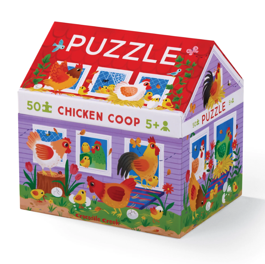 A colorful jigsaw puzzle box featuring a cheerful chicken coop design, showcasing various chickens, birds, and eggs around a vibrant backyard scene, designed for ages 5 and up, made by Crocodile Creek.