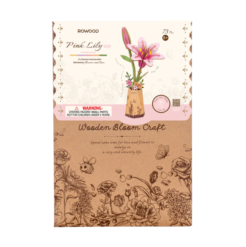 Pink Lily DIY craft kit by Robotime, featuring a wooden flower arrangement. The package showcases a beautifully designed illustration of flowers and a vase. It contains 73 pieces for creative assembly, making it a perfect activity for ages 8 and up. The overall aesthetic promotes relaxation and artistry.