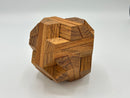 Stewart Coffin's Egyptian - STC 23A is a beautifully crafted mechanical puzzle made from high-quality wood. The intricate design features interlocking pieces that challenge the mind while providing a tactile experience. This appealing puzzle is ideal for fans of brain-teasers and those who appreciate fine craftsmanship.