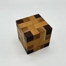 Convolution - STC #30 mechanical puzzle by Stewart Coffin, featuring an intricate design of interlocking wooden pieces in warm tones, perfect for puzzle enthusiasts.
