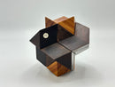 Rosebud -STC #39 w/peg, a beautifully crafted mechanical puzzle made from various types of wood, featuring interlocking pieces and a number '39' sticker for identification. The design showcases geometric shapes and a polished finish, making it an elegant addition to any collection.