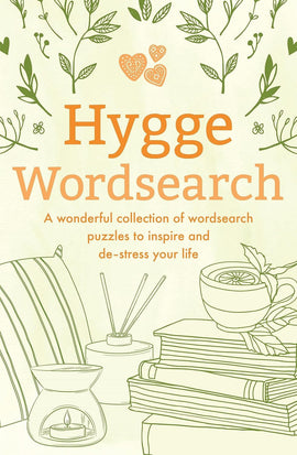 Cover of the 'Hygge Wordsearch' book by Sirius, featuring a cozy design with illustrations of plants, candles, and stacks of books, inviting readers to enjoy a collection of wordsearch puzzles that promote relaxation and inspiration.