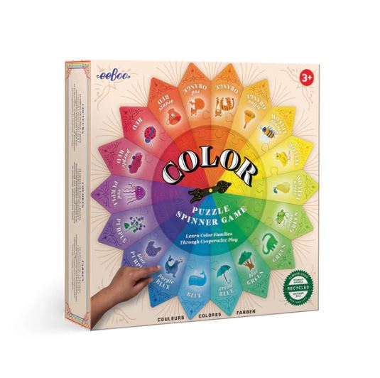 Color Puzzle Spinner Game by Eeboo features a vibrant design with color segments and illustrations to help children learn color families through interactive play. Suitable for ages 3 and up, the game encourages cooperative gameplay and visual learning.