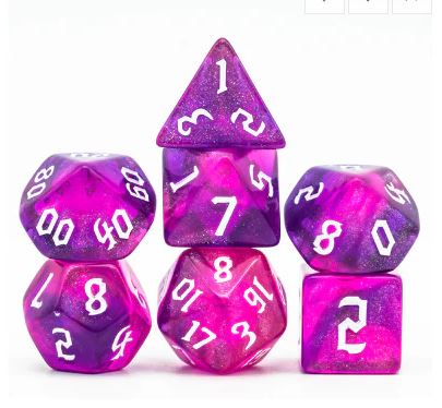 A vibrant Gravity Element RPG Dice Set from Foam Brain Games, featuring six polyhedral dice in shades of purple with white numerical markings. The set includes a variety of shapes, each showcasing a mesmerizing glittery finish, perfect for tabletop gaming.