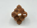 The Octahedral Cluster STC #31-A, a wooden mechanical puzzle by Stewart Coffin, showcases a unique octahedral assembly of hexagonal pieces. Sturdy craftsmanship with a rich brown finish, it encourages spatial reasoning and problem-solving.