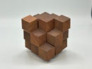 The Octahedral Cluster STC #31-A is a unique mechanical puzzle made from intricately arranged wooden cubes, showcasing a rich, natural wood finish. Each cube interlocks to create an octahedral shape, providing a captivating challenge for puzzle enthusiasts.