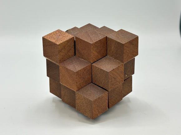 The Octahedral Cluster STC #31-A is a unique mechanical puzzle made from intricately arranged wooden cubes, showcasing a rich, natural wood finish. Each cube interlocks to create an octahedral shape, providing a captivating challenge for puzzle enthusiasts.