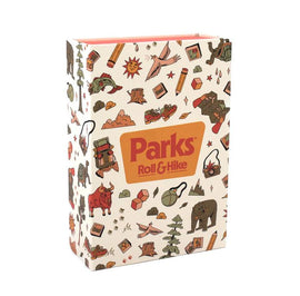 The game box for 'Parks: Roll & Hike' by Keymaster Games. The colorful exterior features whimsical illustrations of wildlife, camping gear, and nature-themed icons. The logo is prominently displayed in yellow and red.