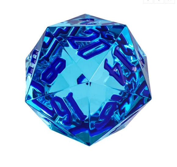 The 55mm Titan D20 - Nautical Clear is a vibrant blue 20-sided die featuring embossed numbers in a contrasting blue, ideal for tabletop games and RPGs. The die showcases a crystal-clear finish, enhancing its aesthetic appeal and making it a perfect accessory for gamers and collectors.