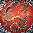 Traditional Chinese dragon painting on a red background