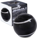 A black spin ball with its packing behind it
