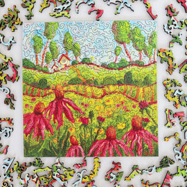 Colorful puzzle with a partially completed landscape scene featuring trees and flowers.