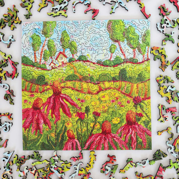 Colorful puzzle with a partially completed landscape scene featuring trees and flowers.
