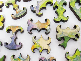 Uniquely shaped puzzle pieces on a white background