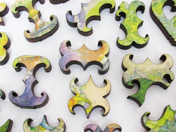 Uniquely shaped puzzle pieces on a white background