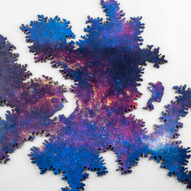 Infinity puzzle showing astronaut-shaped whimsy piece