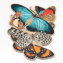 Jigsaw made up of colorful butterflies