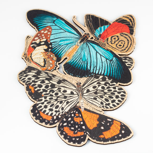 Jigsaw made up of colorful butterflies